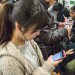 Girl With Phone - Metro, Shanghai, China